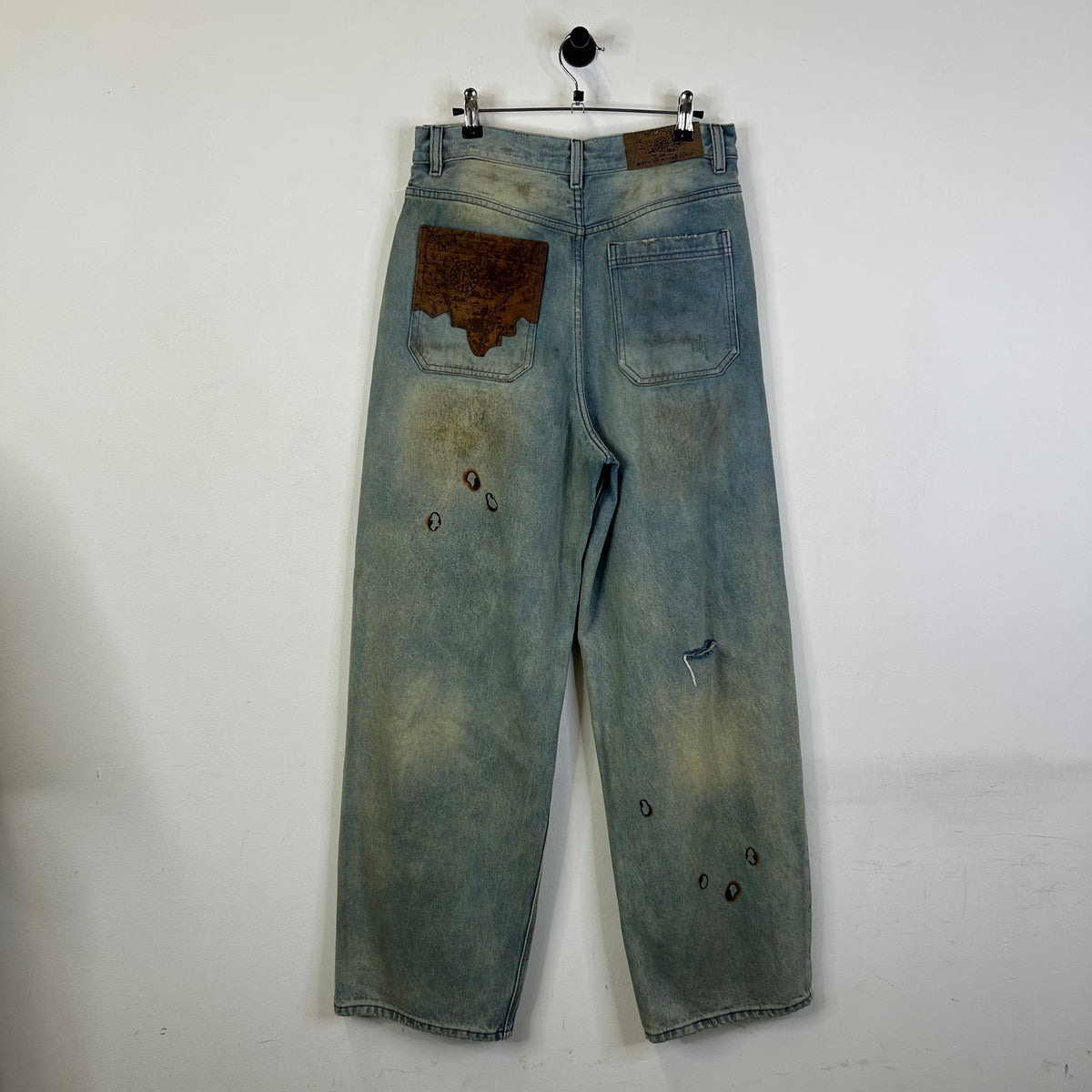 BIRTH OF A ROYAL CHILD DIRTY WASHED WAXED BAGGY JEANS