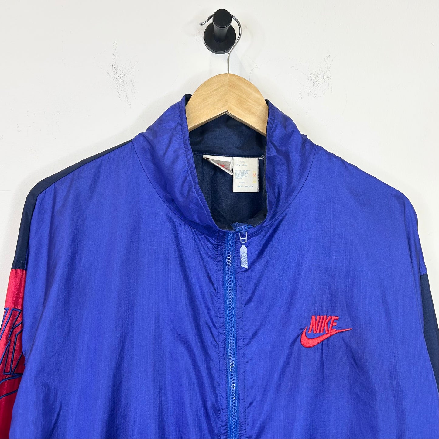 BLUE AND RED NIKE WINDBREAKER JACKET