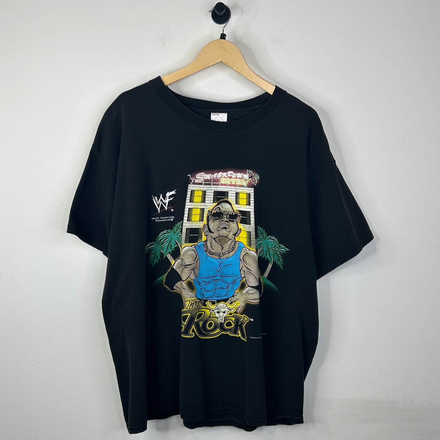 THE ROCK WWF CARTOON TEE ON FLOOR