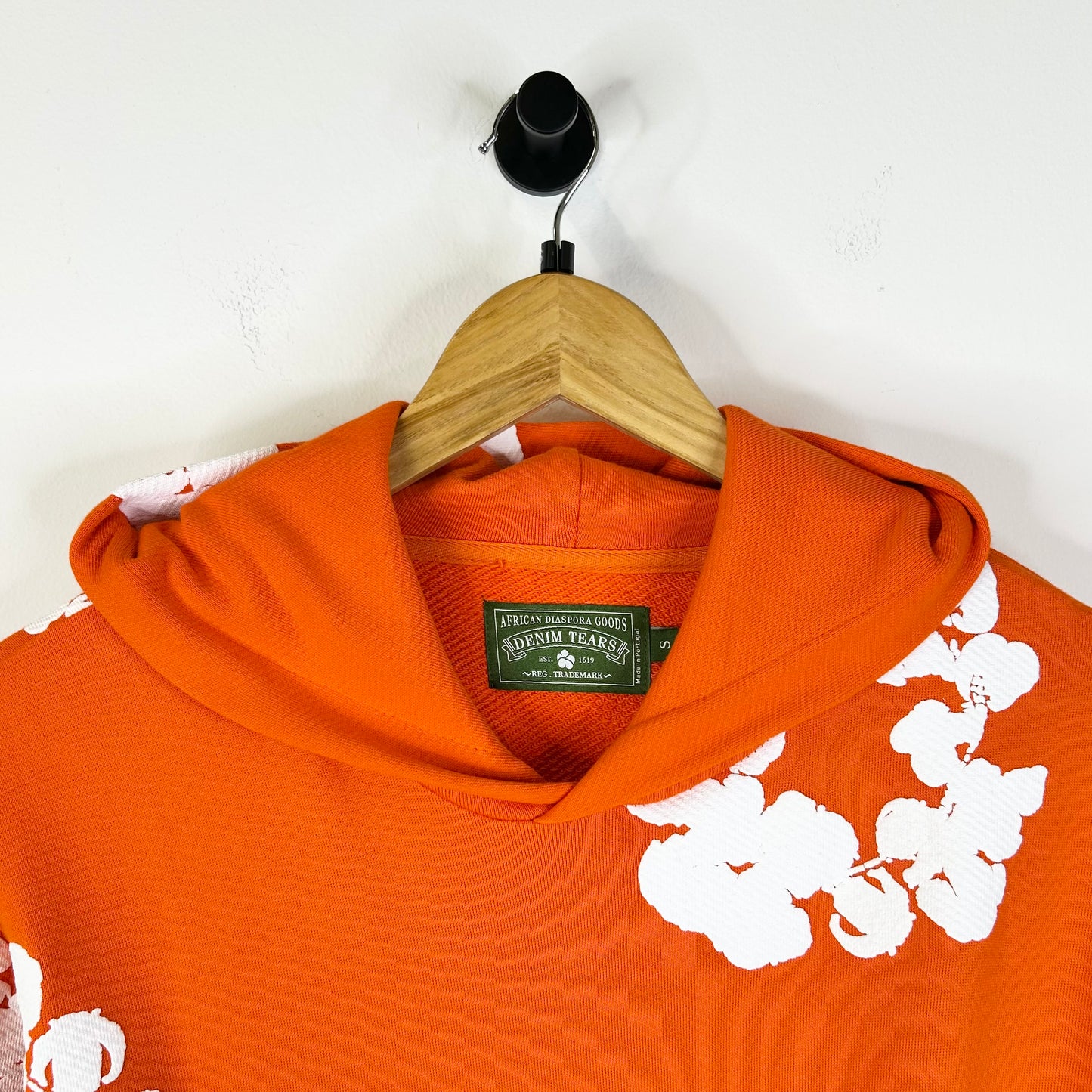 DENIM TEARS ORANGE WREATH HOODIE