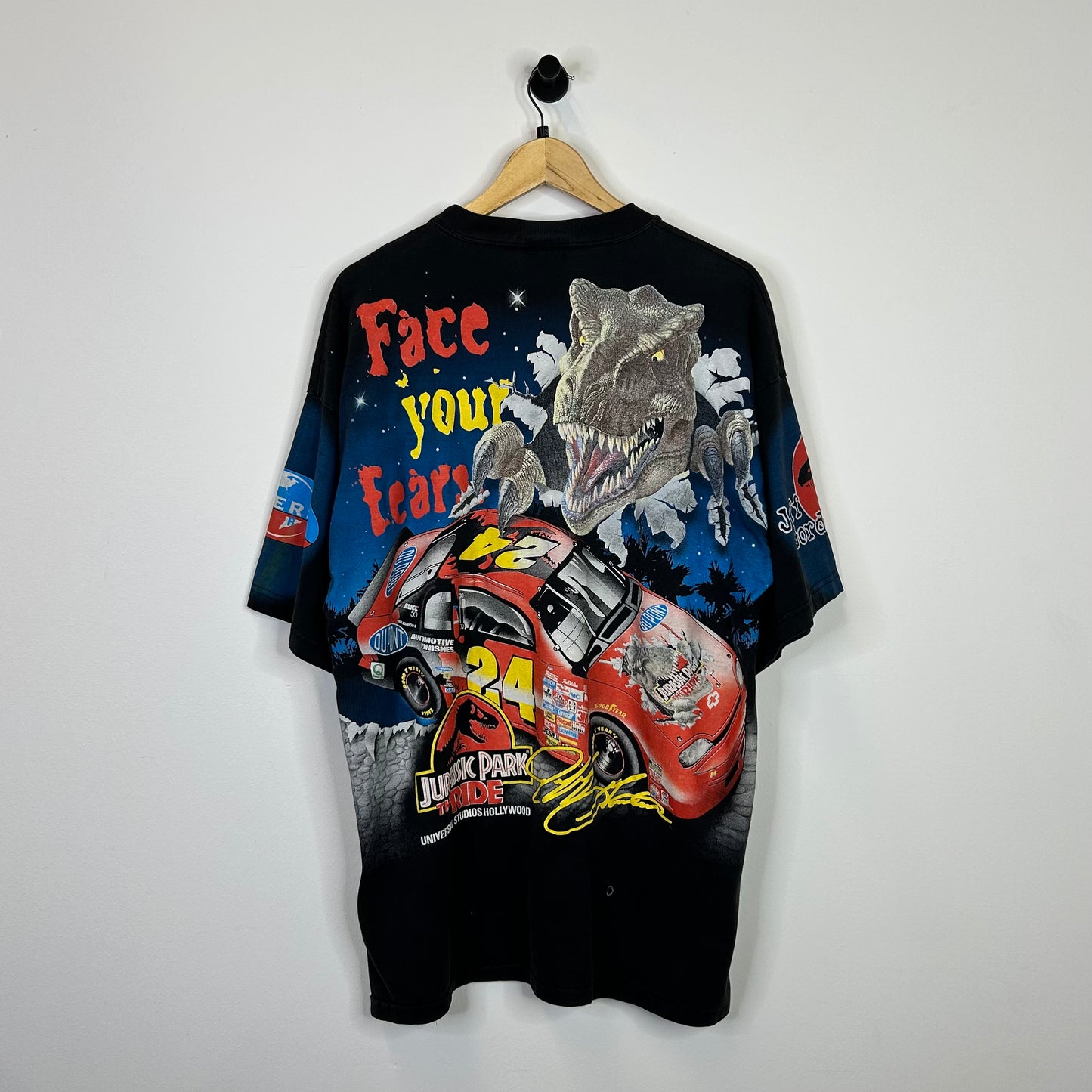 1997 JURASSIC PARK SOMETHING HAS SURVIVED RACING TEE