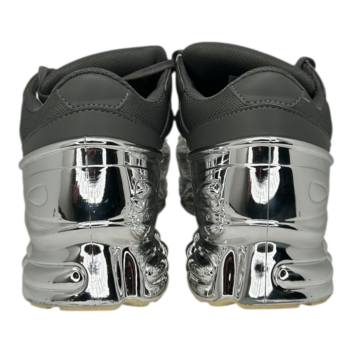 PREOWNED ADIDAS X RAF SIMMONS OZWEEGO GREY METALLIC