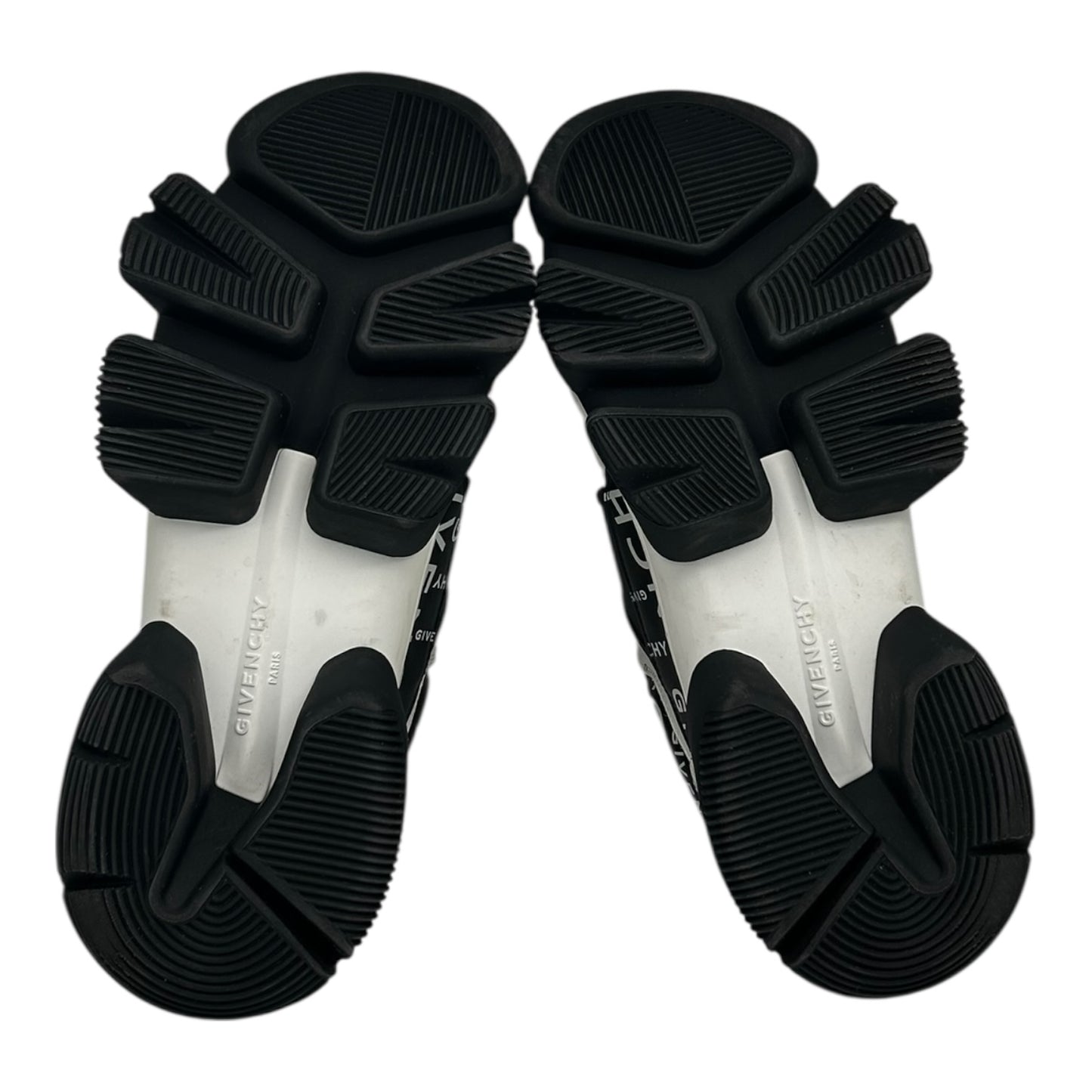 PREOWNED GIVENCHY JAW LOW BLACK AND WHITE