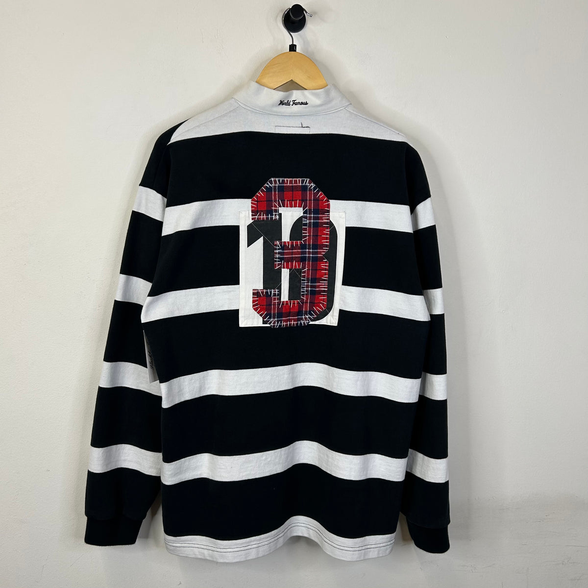SUPREME STRIPED RUGBY BLACK POLO FW25