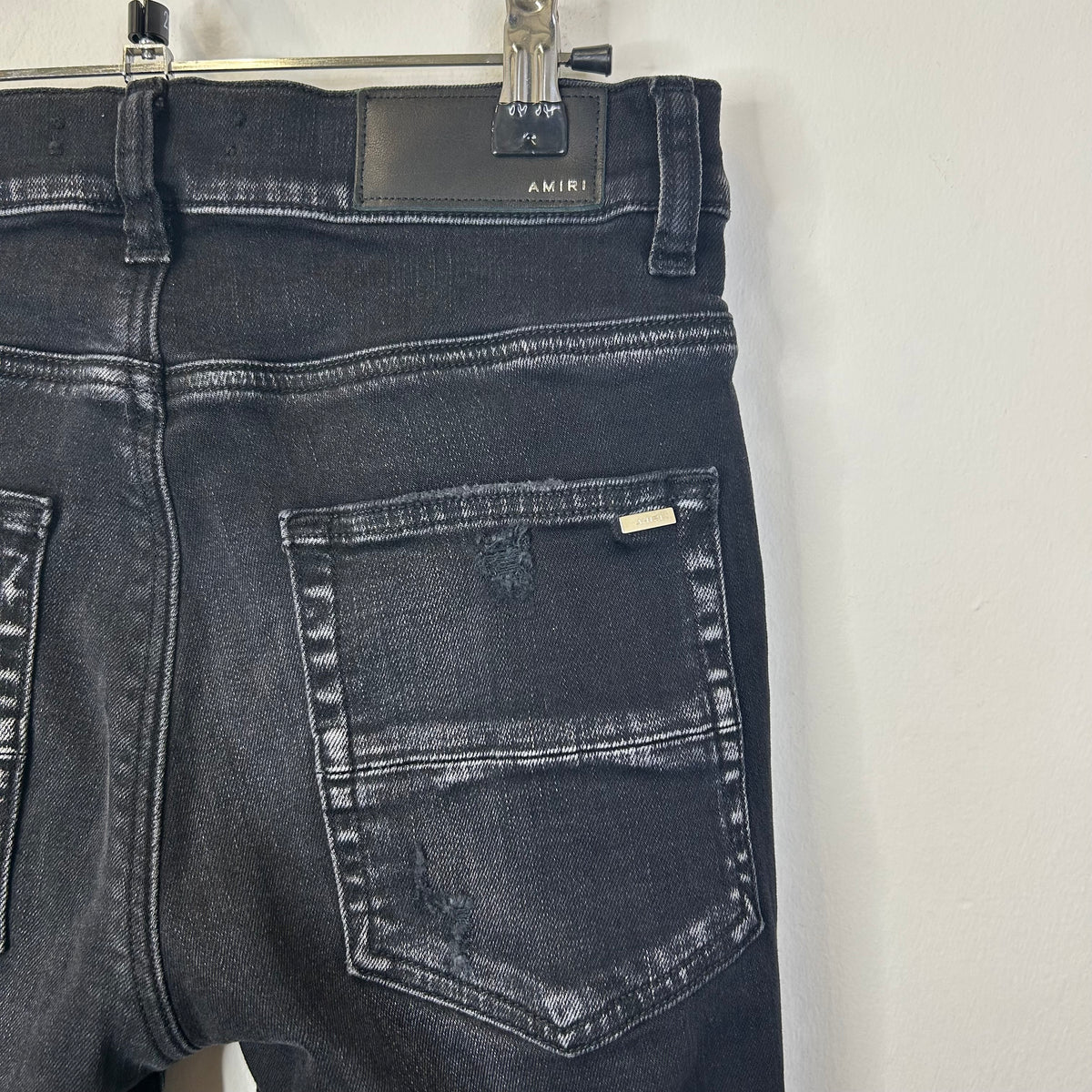 AMIRI BLACK RIPPED SKINNY JEANS