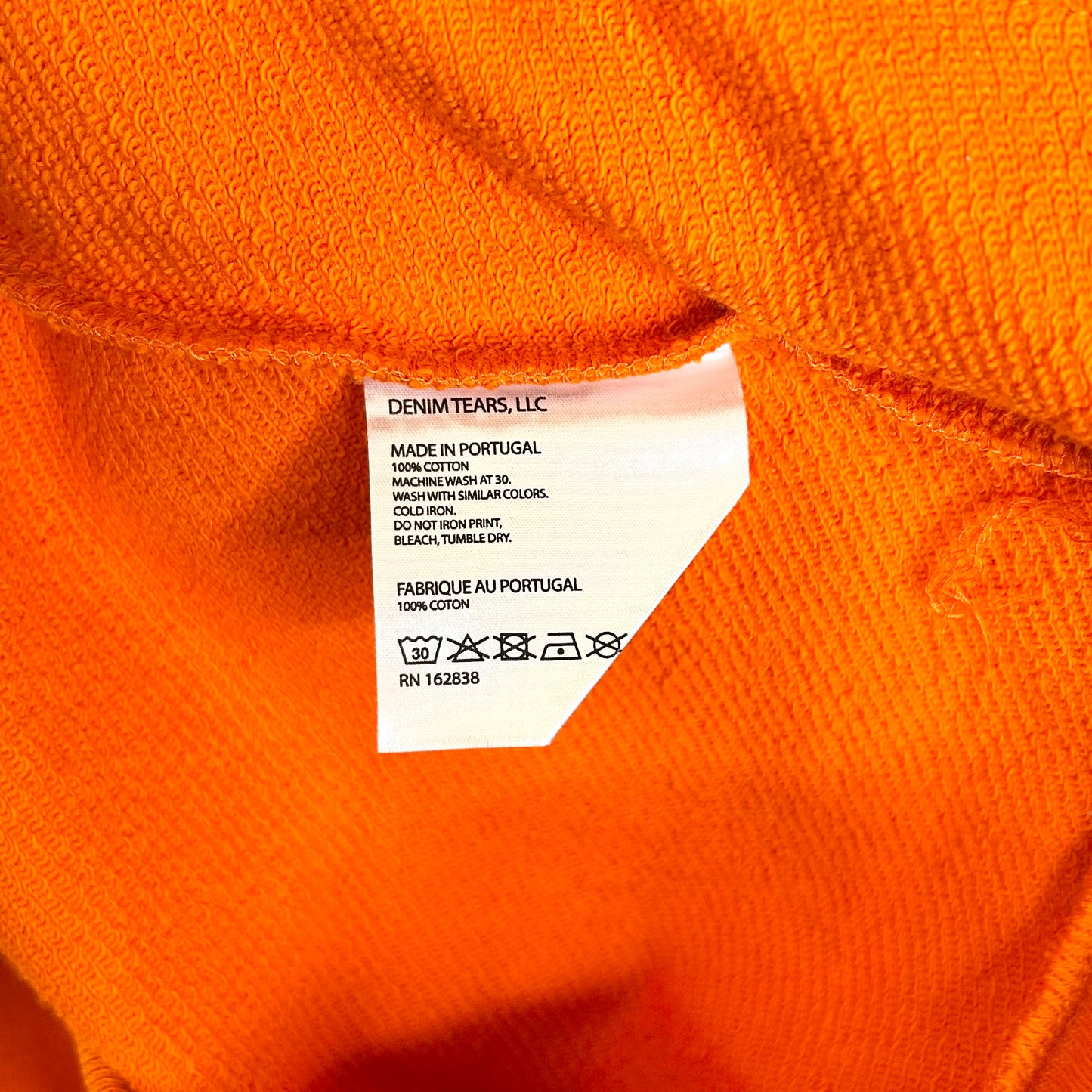 DENIM TEARS ORANGE WREATH HOODIE