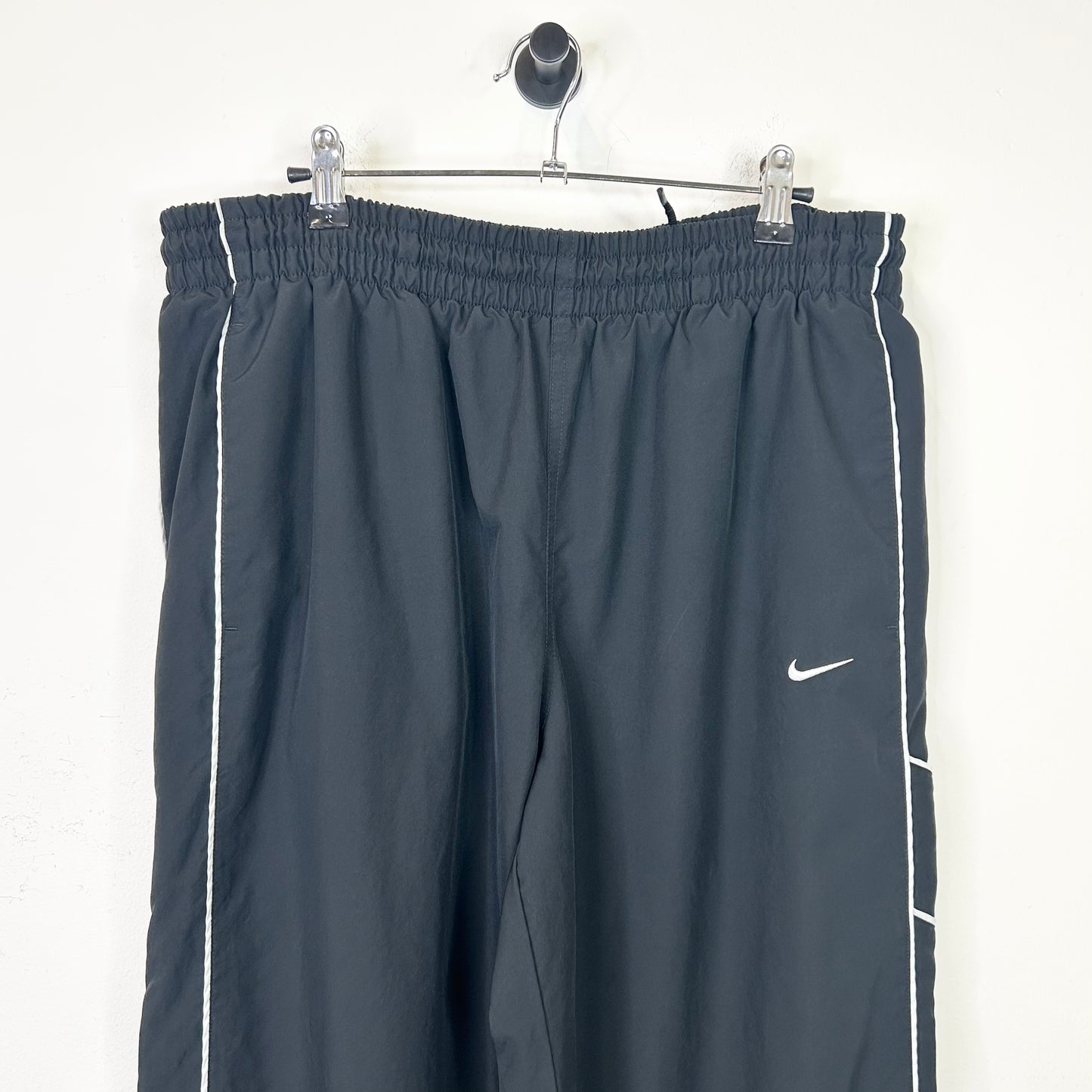 BLACK AND WHITE STRIPED NIKE TRACK PANTS