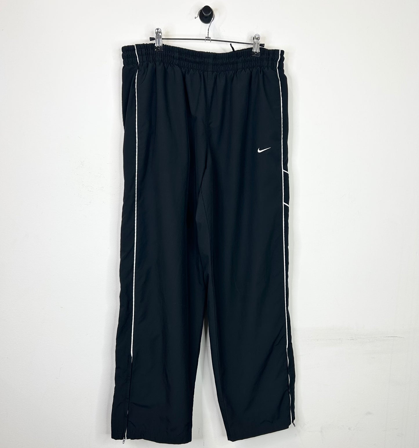 BLACK AND WHITE STRIPED NIKE TRACK PANTS