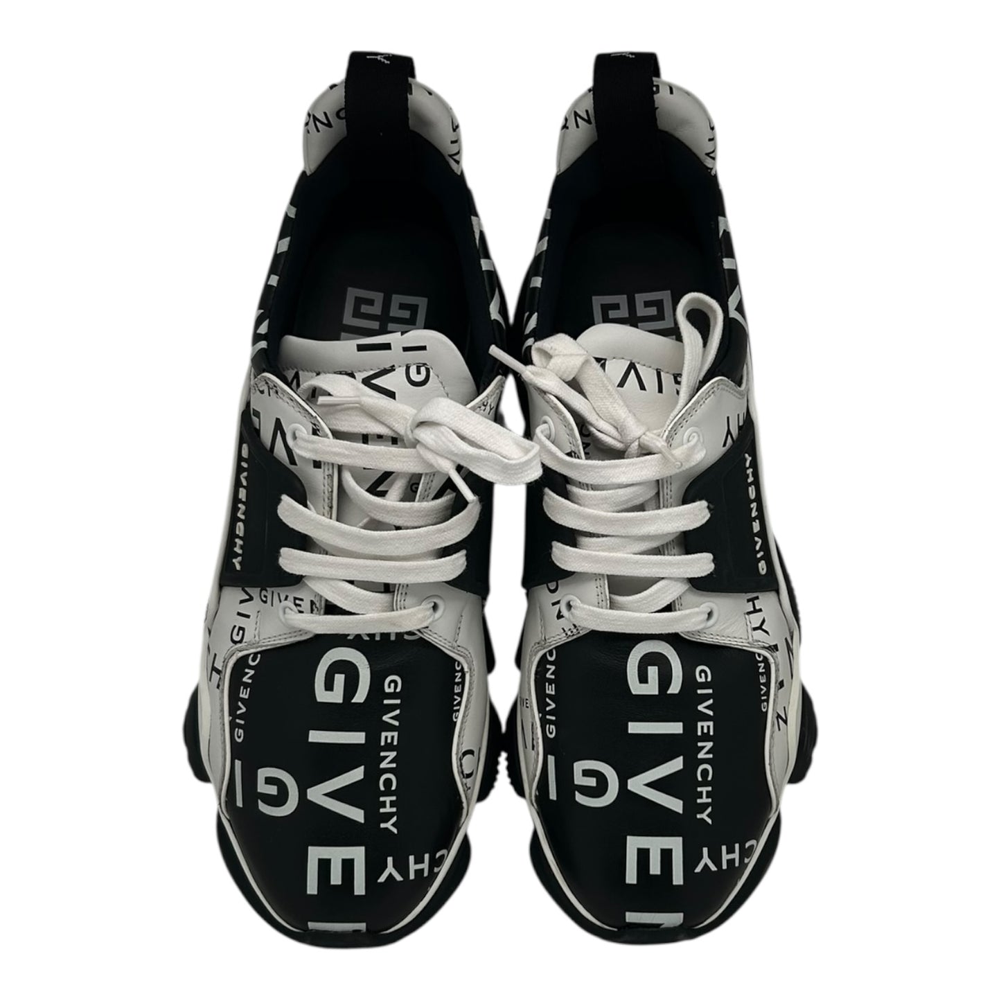 PREOWNED GIVENCHY JAW LOW BLACK AND WHITE