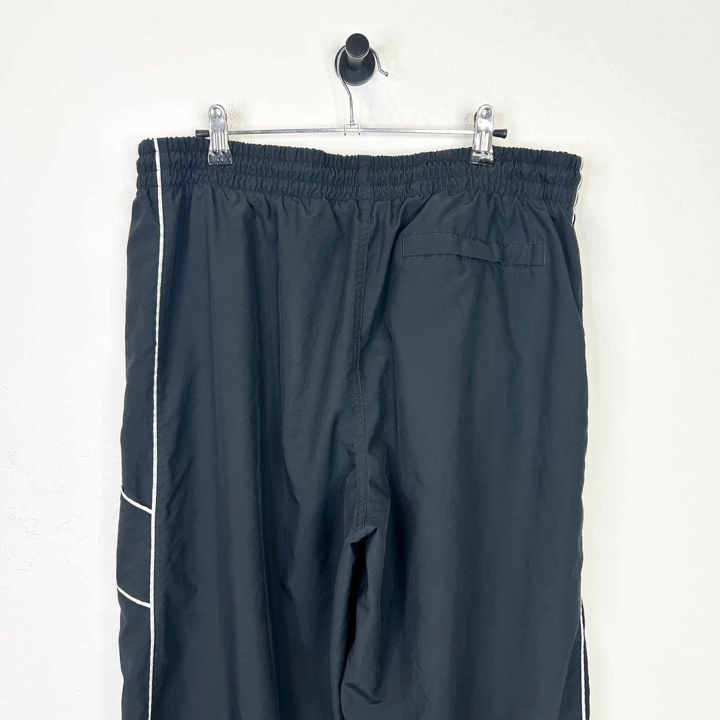 BLACK AND WHITE STRIPED NIKE TRACK PANTS