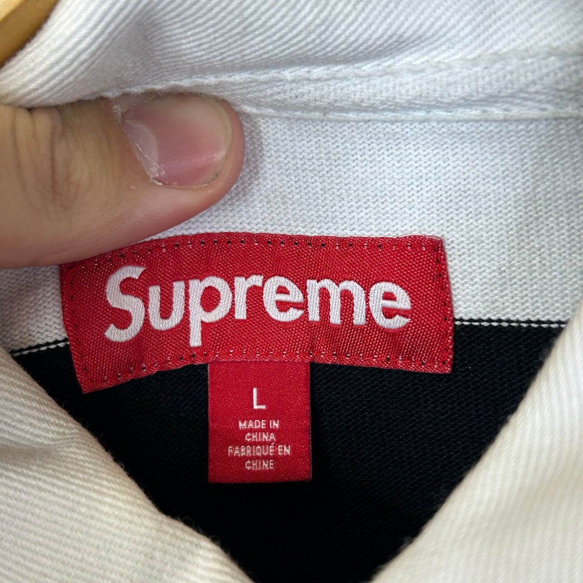 SUPREME STRIPED RUGBY BLACK POLO FW25