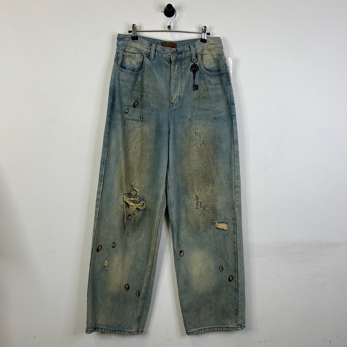 BIRTH OF A ROYAL CHILD DIRTY WASHED WAXED BAGGY JEANS