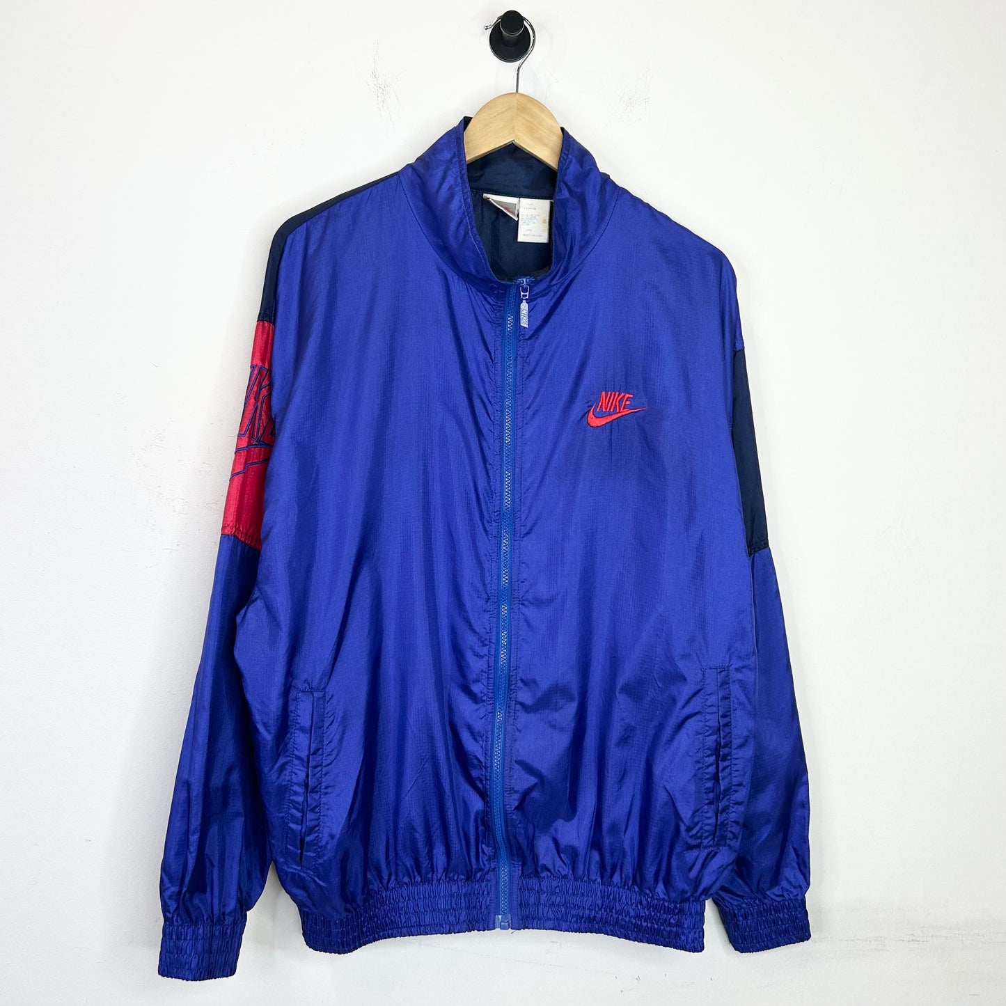 BLUE AND RED NIKE WINDBREAKER JACKET