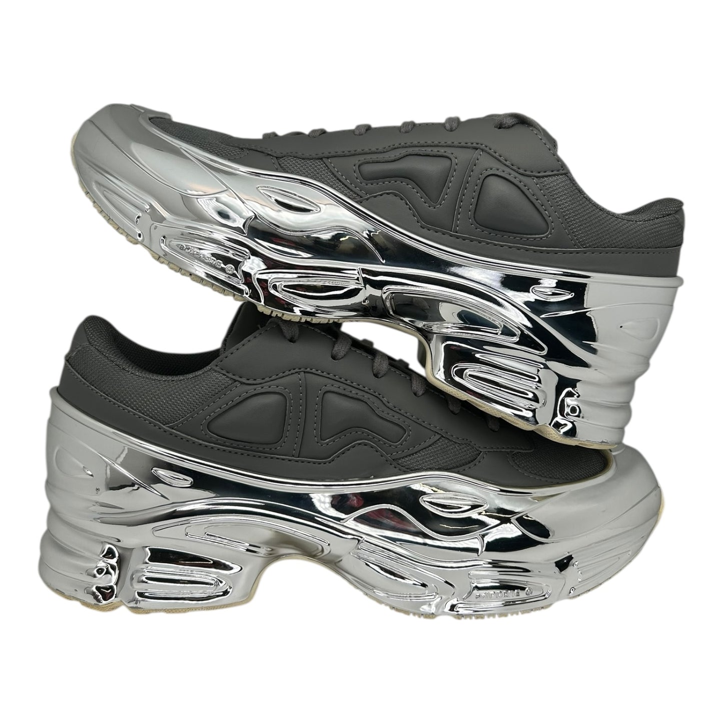 PREOWNED ADIDAS X RAF SIMMONS OZWEEGO GREY METALLIC