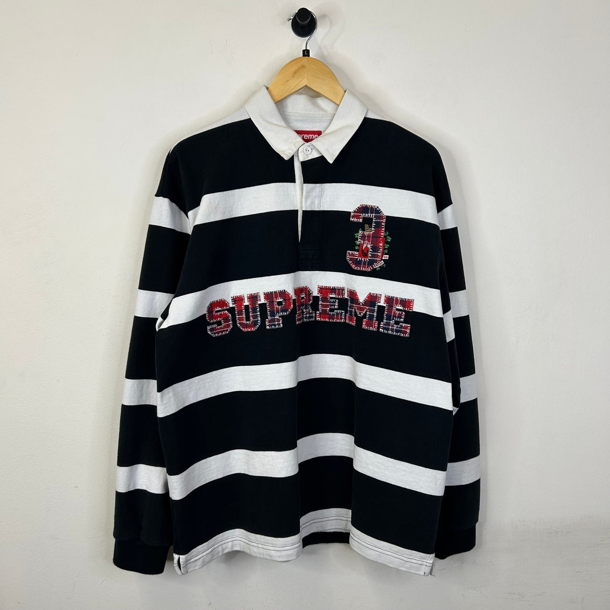 SUPREME STRIPED RUGBY BLACK POLO FW25