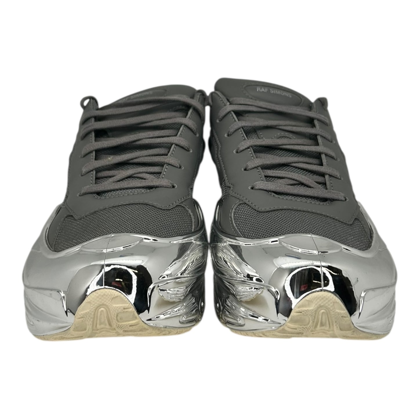PREOWNED ADIDAS X RAF SIMMONS OZWEEGO GREY METALLIC