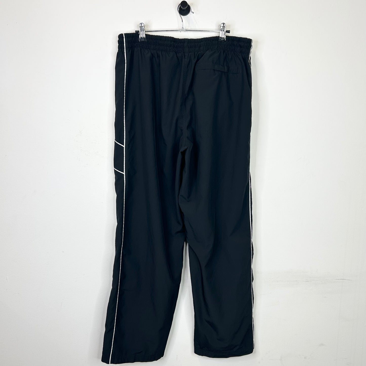 BLACK AND WHITE STRIPED NIKE TRACK PANTS