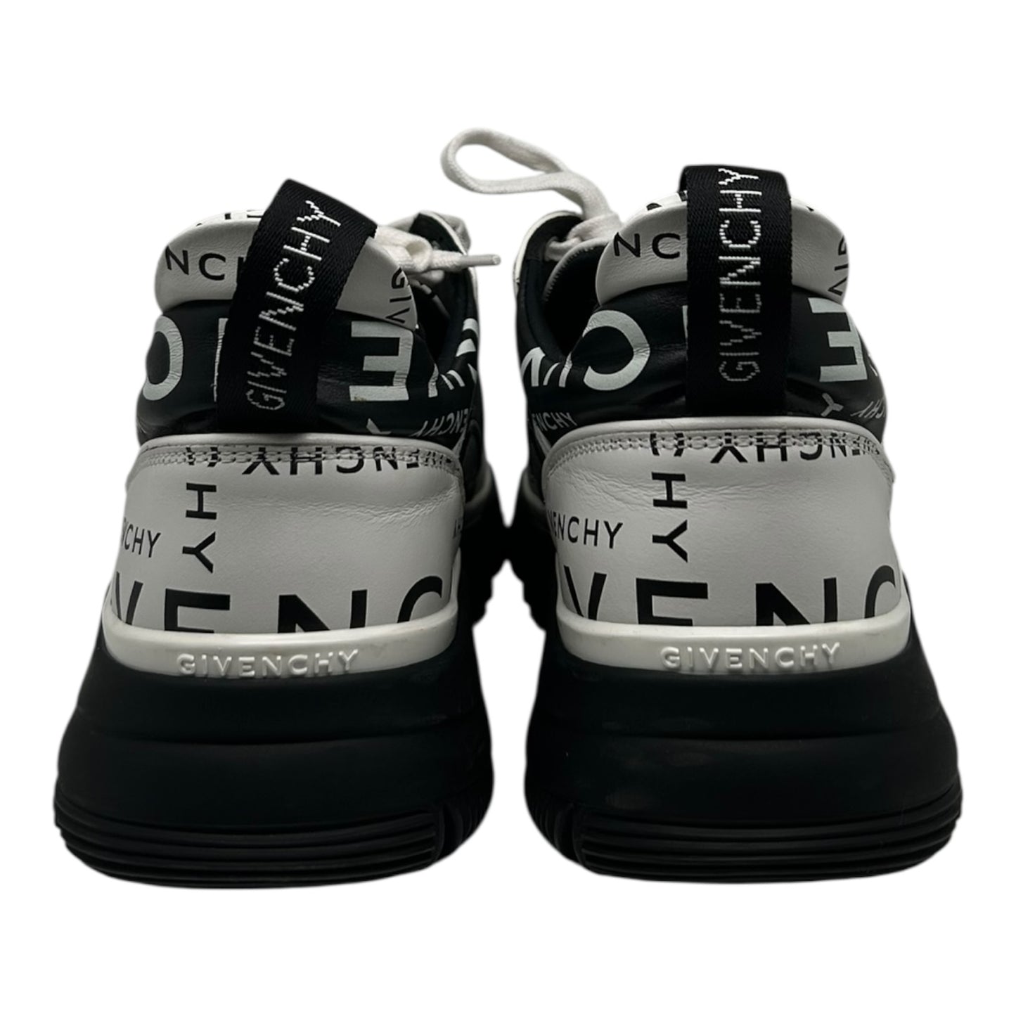 PREOWNED GIVENCHY JAW LOW BLACK AND WHITE