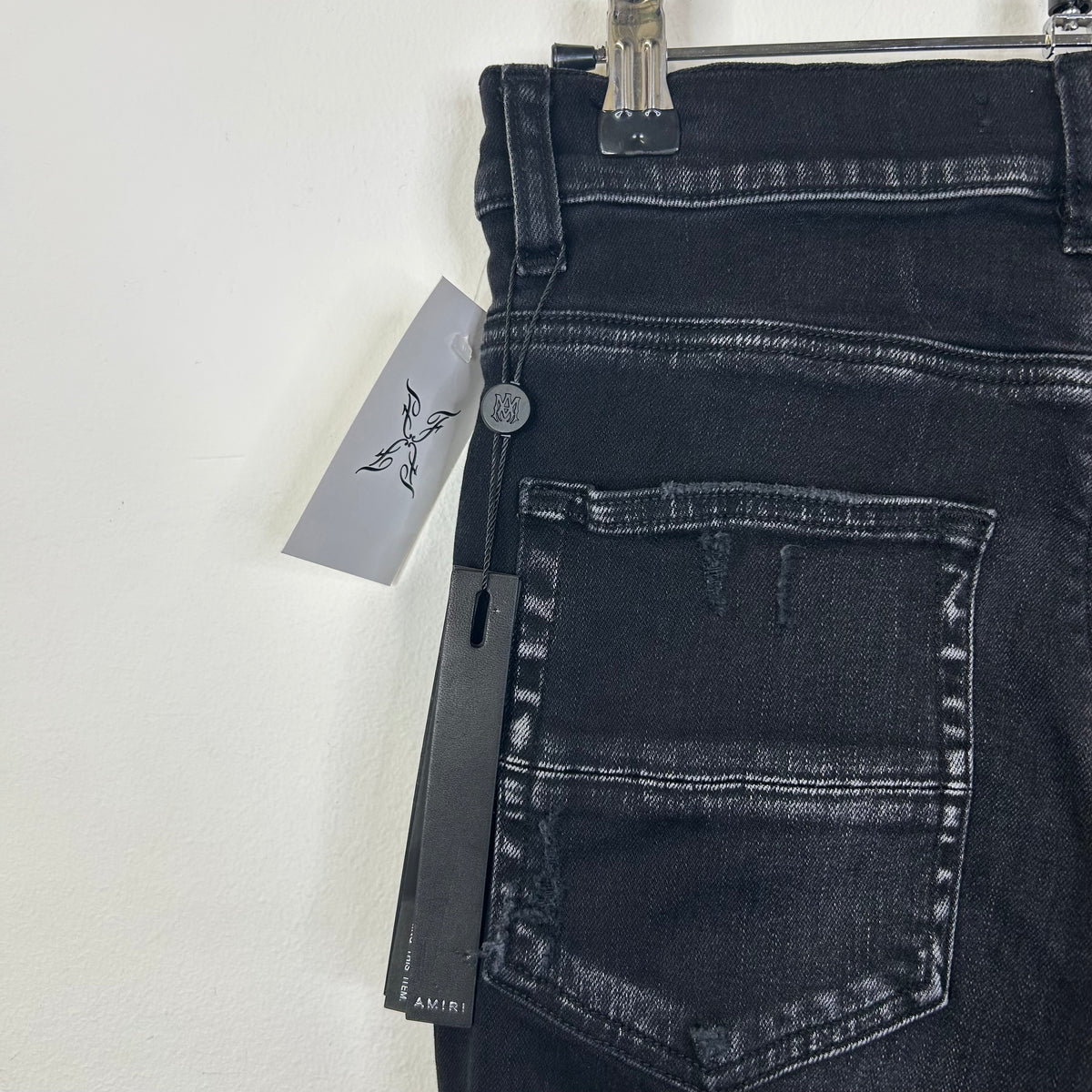 AMIRI BLACK RIPPED SKINNY JEANS