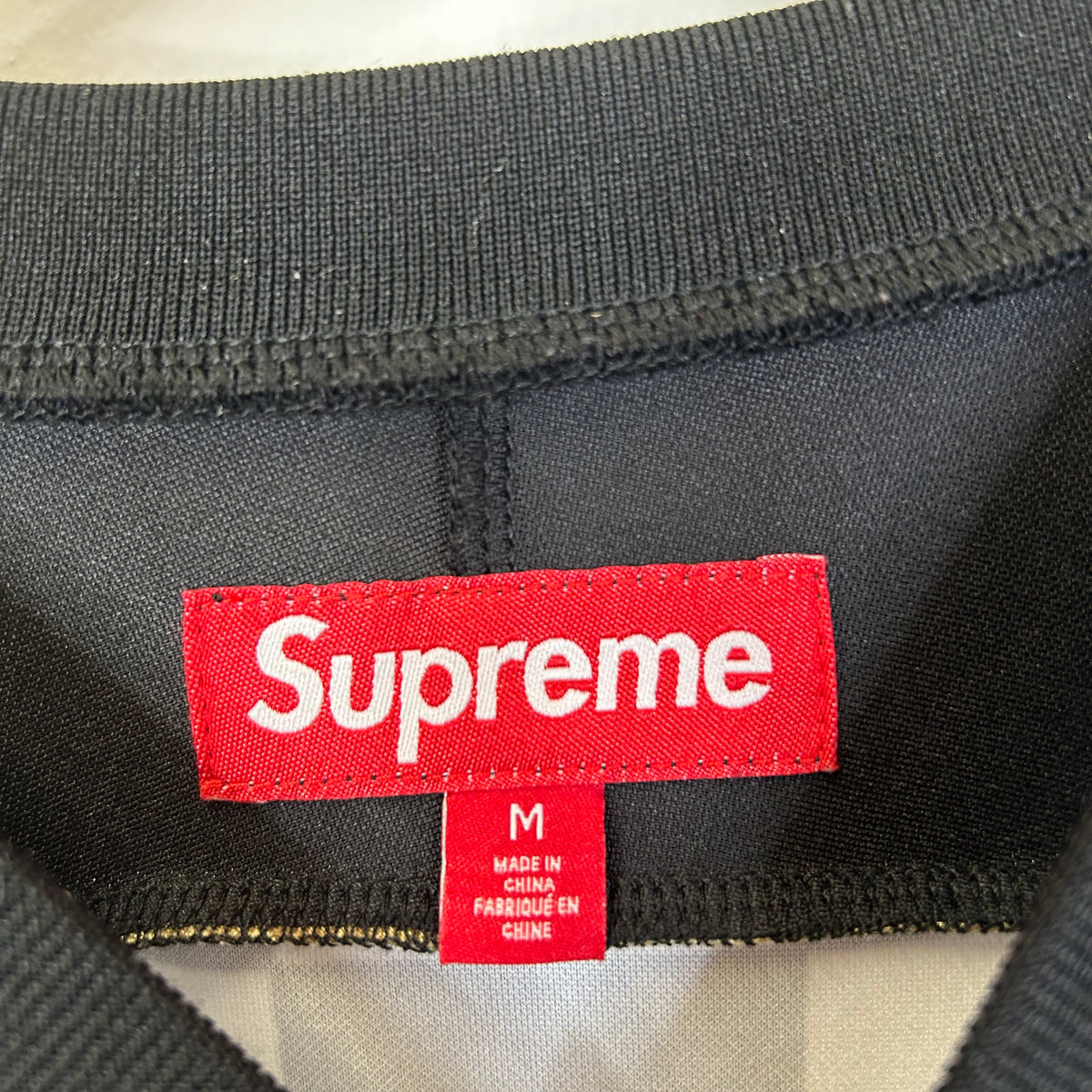 SUPREME CHECKERBOARD SOCCER JERSEY