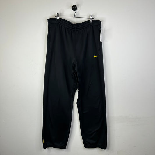 NIKE BLACK TRACK PANTS YELLOW LOGO