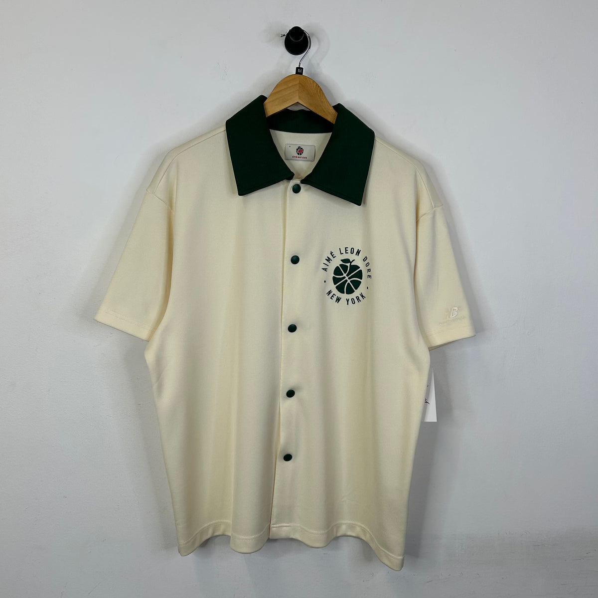 AIME LEON DORE X NEW BALANCE COLLARED CREAM TEE