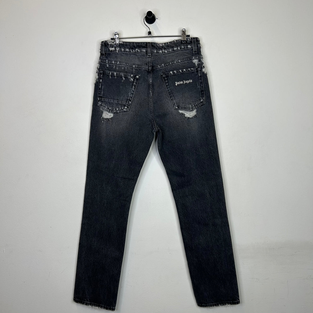 PALM ANGELS DISTRESSED STRAIGHT LEG JEANS
