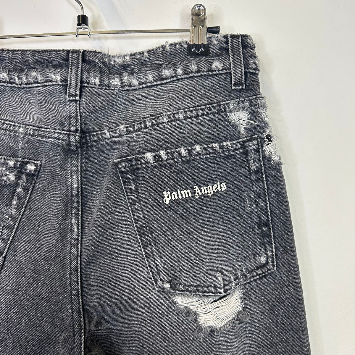 PALM ANGELS DISTRESSED STRAIGHT LEG JEANS