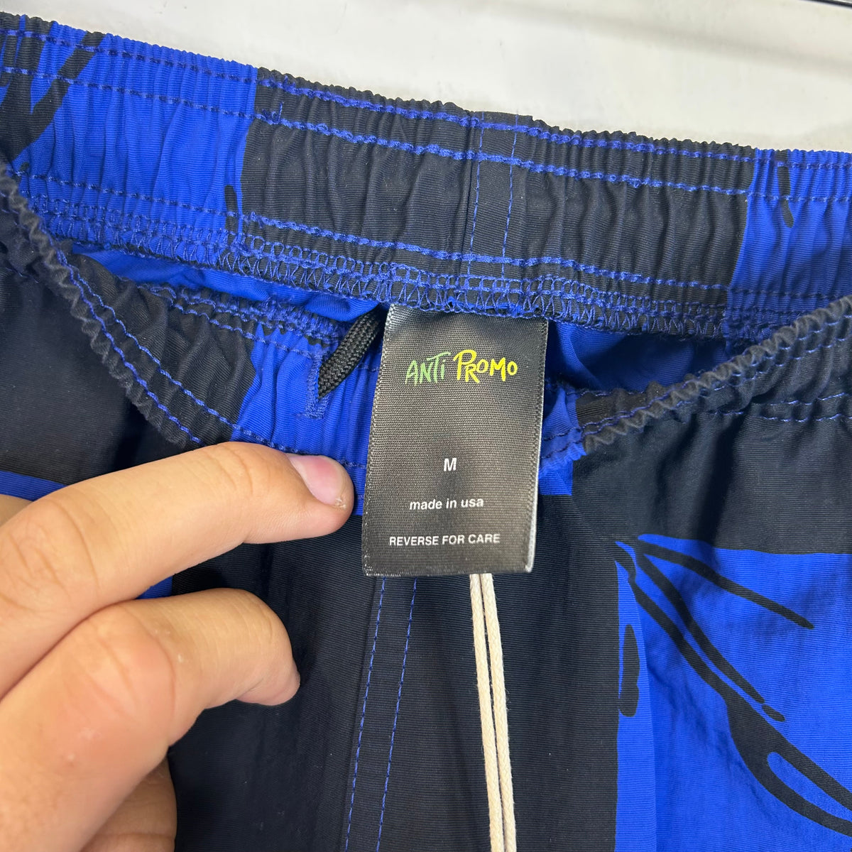 MATTY BOY ANTI-PROMO 9 9 EYES CHECKERED NYLON SHORTS BLUE AND BLACK