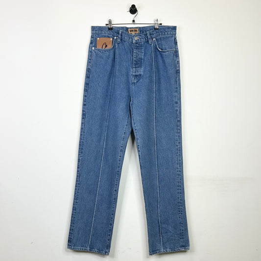 CORTEIZ PLEATED LIGHT WASH JEANS